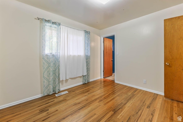 263 E 1350 N, Bountiful, UT 84010 - spare room featuring wood finished floors and baseboards