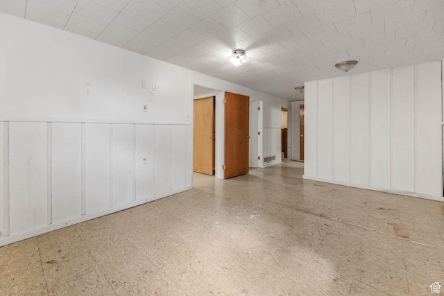 263 E 1350 N, Bountiful, UT 84010 - empty room featuring a decorative wall and wainscoting