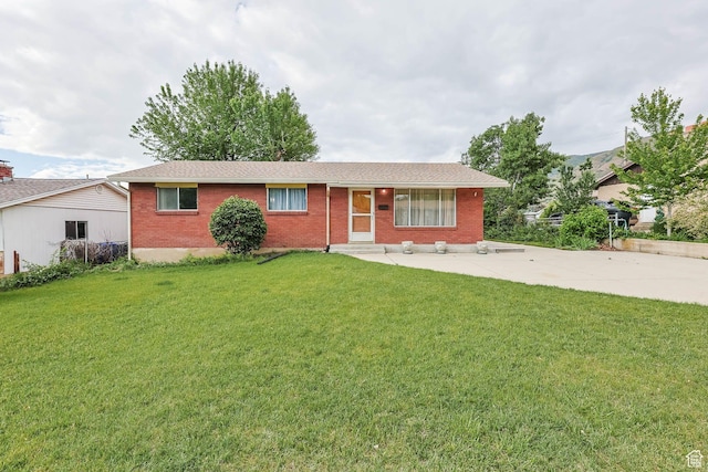 263 E 1350 N, Bountiful, UT 84010 - ranch-style house with brick siding, a front lawn, and a shingled roof
