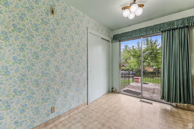 263 E 1350 N, Bountiful, UT 84010 - empty room featuring wallpapered walls and ceiling fan