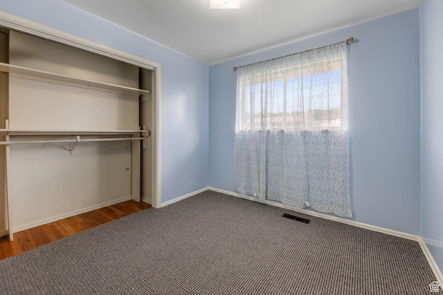 263 E 1350 N, Bountiful, UT 84010 - unfurnished bedroom featuring wood finished floors, a closet, and baseboards