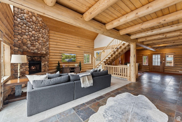 450 Crestview Dr, Summit Park, UT 84098 - living room with a fireplace, wooden ceiling, stairway, rustic walls, and stone tile floors