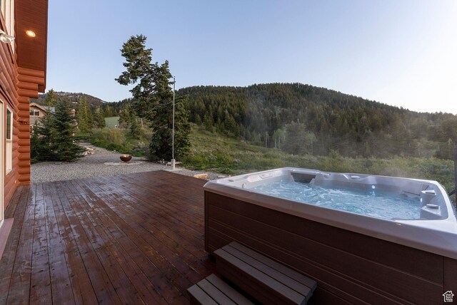 450 Crestview Dr, Summit Park, UT 84098 - wooden deck featuring a forest view, a hot tub, and a mountain view