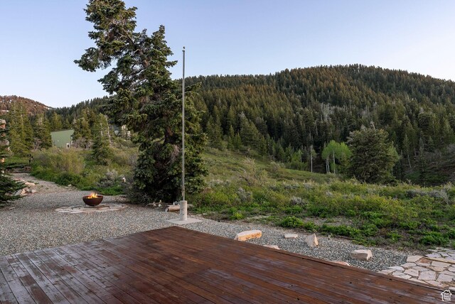 450 Crestview Dr, Summit Park, UT 84098 - wooden terrace with a view of trees and a mountain view