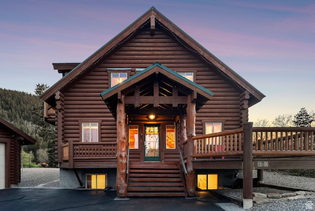 450 Crestview Dr, Summit Park, UT 84098 - log-style house featuring log exterior, covered porch, and stairs