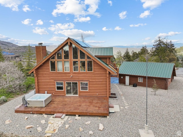 450 Crestview Dr, Summit Park, UT 84098 - rear view of property with log exterior, a deck, a chimney, and a jacuzzi