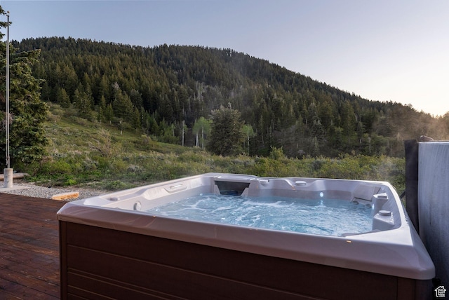 450 Crestview Dr, Summit Park, UT 84098 - deck featuring a forest view, a hot tub, and a mountain view