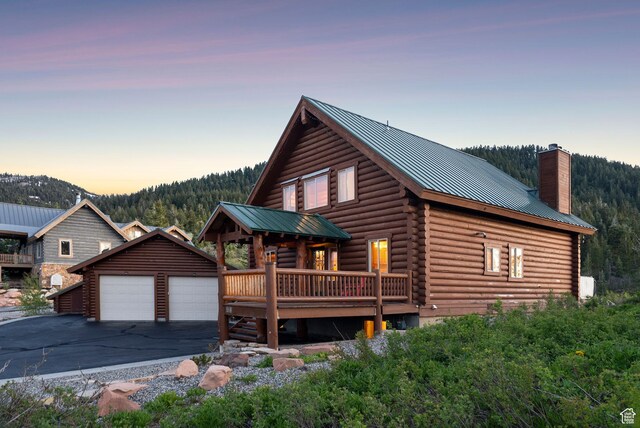450 Crestview Dr, Summit Park, UT 84098 - log cabin with an outdoor structure, log exterior, a chimney, metal roof, and a wooden deck