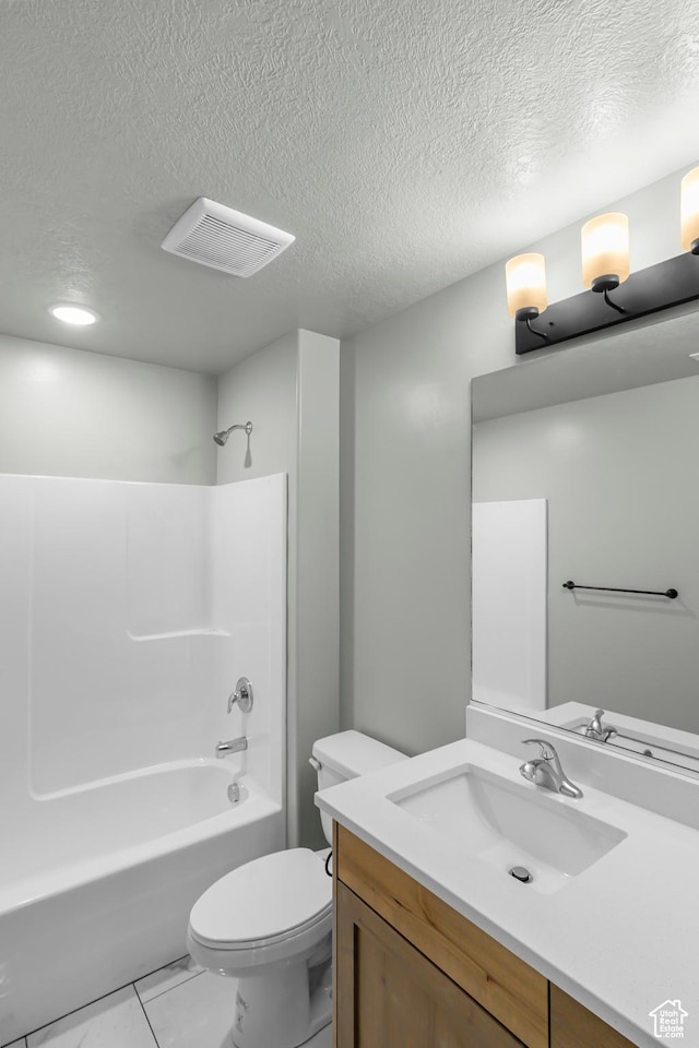 516 S 1580 W Unit 130, Logan, UT 84321 - full bath with a textured ceiling, bathtub / shower combination, vanity, and toilet