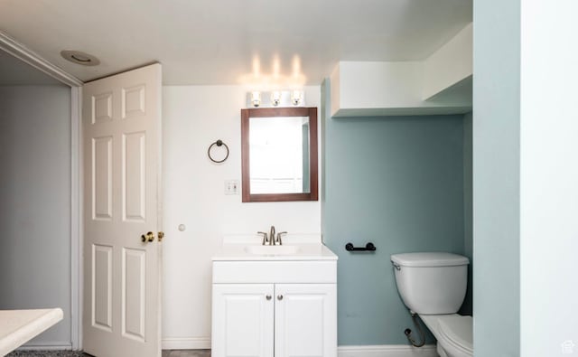 463 Vine St, Clearfield, UT 84015 - bathroom with toilet, vanity, and baseboards