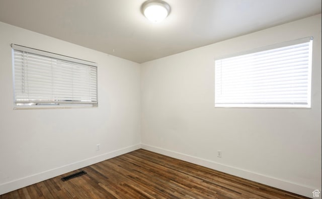 463 Vine St, Clearfield, UT 84015 - spare room with baseboards and dark wood-type flooring