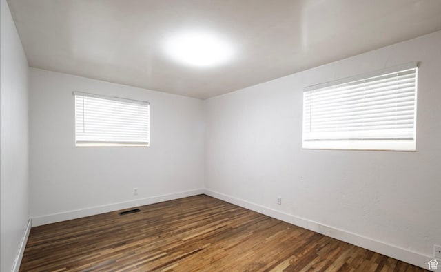 463 Vine St, Clearfield, UT 84015 - empty room with baseboards, wood finished floors, and plenty of natural light
