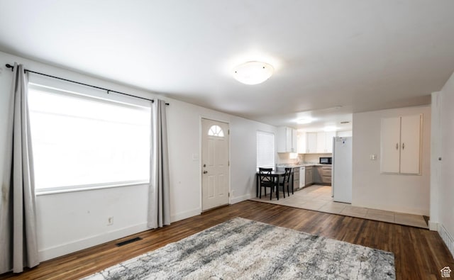 463 Vine St, Clearfield, UT 84015 - foyer with light wood-type flooring and baseboards