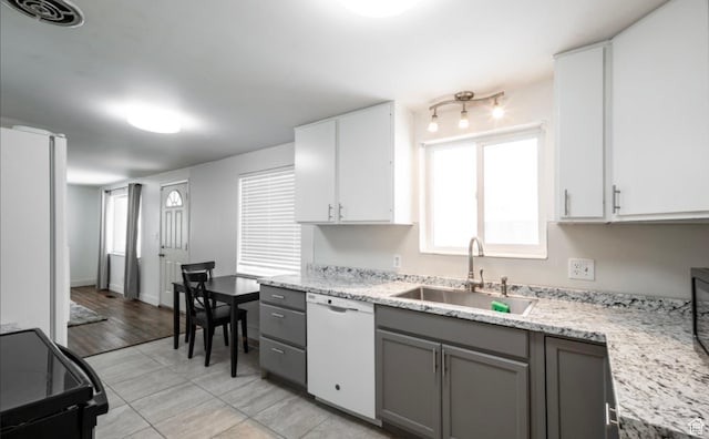 463 Vine St, Clearfield, UT 84015 - kitchen featuring white appliances, a sink, gray cabinets, light tile patterned floors, and white cabinets
