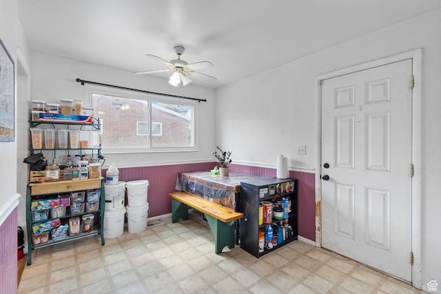 3466 W 4305 S, West Valley City, UT 84119 - dining room with tile patterned floors, a ceiling fan, and wainscoting