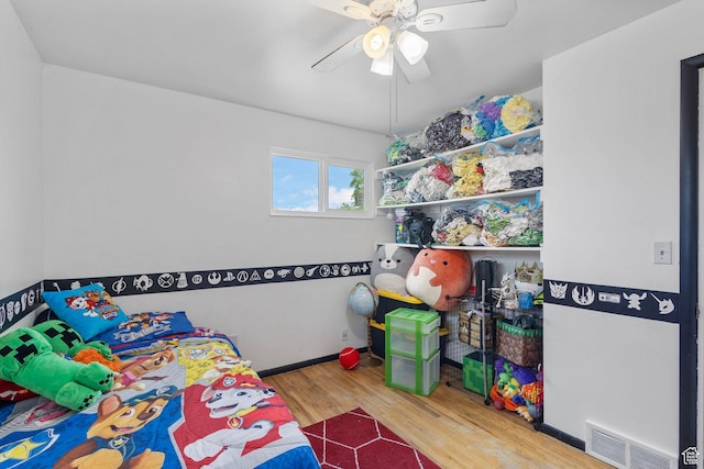 3466 W 4305 S, West Valley City, UT 84119 - bedroom featuring wood finished floors, ceiling fan, and baseboards