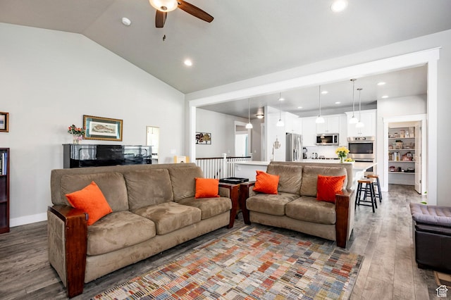 10352 S Sturgeon Dr W, South Jordan, UT 84009 - living room featuring ceiling fan, wood finished floors, recessed lighting, and high vaulted ceiling