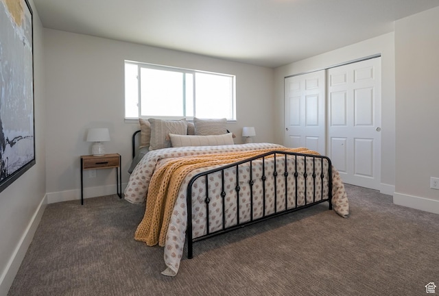 2612 S 8590 W, Magna, UT 84044 - carpeted bedroom featuring a closet and baseboards