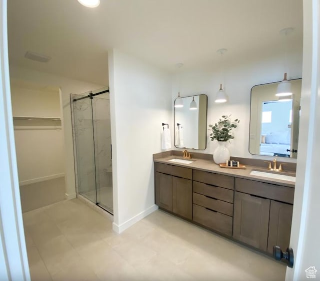 5894 N Canyon Rim Rd E Unit 621, Lehi, UT 84043 - full bath featuring a stall shower, double vanity, baseboards, and tile patterned floors