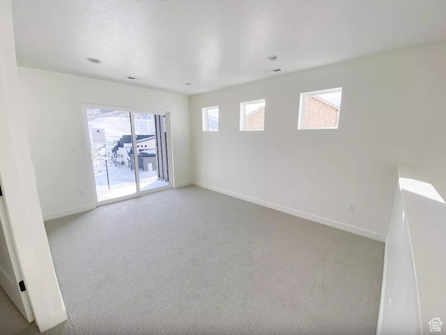 5894 N Canyon Rim Rd E Unit 621, Lehi, UT 84043 - spare room featuring baseboards and carpet flooring