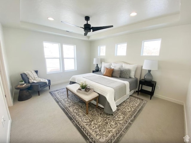 5894 N Canyon Rim Rd E Unit 621, Lehi, UT 84043 - bedroom featuring a raised ceiling, light carpet, multiple windows, and recessed lighting