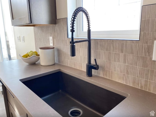 5894 N Canyon Rim Rd E Unit 621, Lehi, UT 84043 - kitchen view of a sink and decorative backsplash