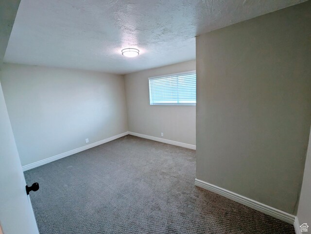 1391 E Mccormick Way, Cottonwood Heights, UT 84121 - empty room with carpet, baseboards, and a textured ceiling