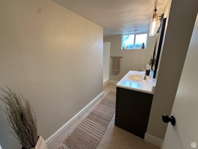 1391 E Mccormick Way, Cottonwood Heights, UT 84121 - bathroom featuring vanity, baseboards, and tile patterned floors