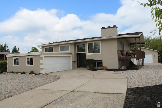 1391 E Mccormick Way, Cottonwood Heights, UT 84121 - view of front of home with a chimney, concrete driveway, an attached garage, stucco siding, and brick siding