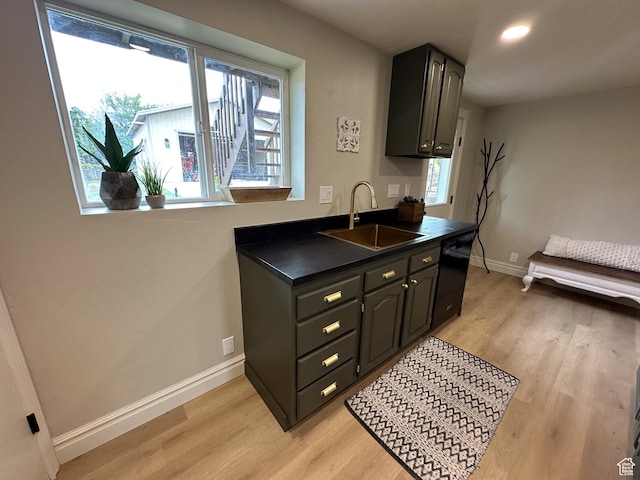 1391 E Mccormick Way, Cottonwood Heights, UT 84121 - kitchen with a sink, dark countertops, light wood-style flooring, plenty of natural light, and recessed lighting