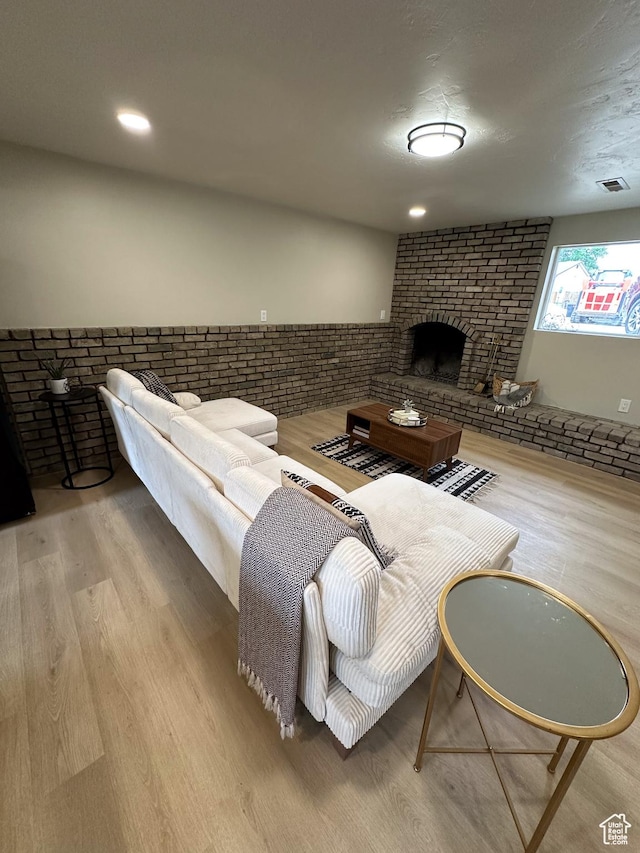 1391 E Mccormick Way, Cottonwood Heights, UT 84121 - living room featuring wood finished floors, a fireplace, a wainscoted wall, and recessed lighting