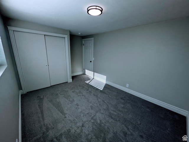 1391 E Mccormick Way, Cottonwood Heights, UT 84121 - unfurnished bedroom featuring a closet, baseboards, and carpet flooring