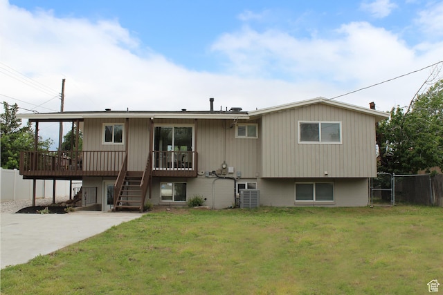1391 E Mccormick Way, Cottonwood Heights, UT 84121 - back of house featuring central AC unit, stairway, and a gate