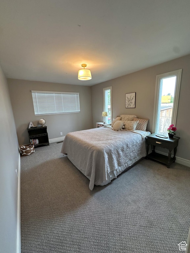 1391 E Mccormick Way, Cottonwood Heights, UT 84121 - bedroom with carpet floors and baseboards