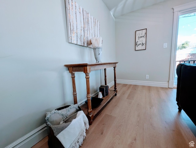 1391 E Mccormick Way, Cottonwood Heights, UT 84121 - corridor with light wood-type flooring and baseboards