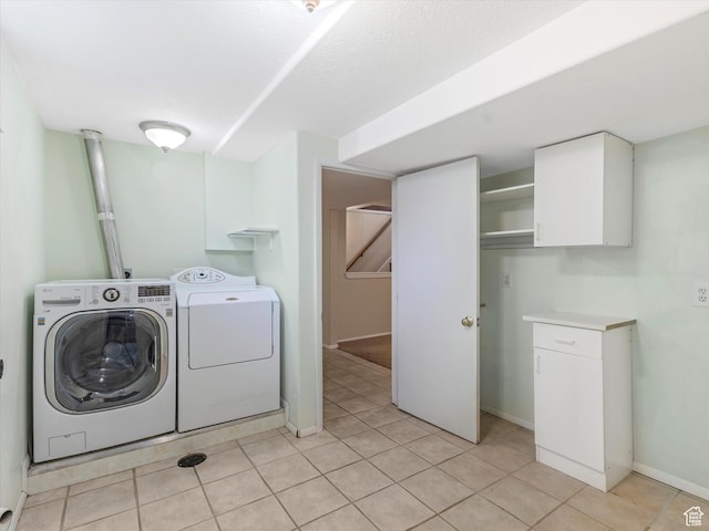 1429 E Sumac Way, Murray, UT 84121 - laundry room featuring washer and dryer, light tile patterned floors, and baseboards