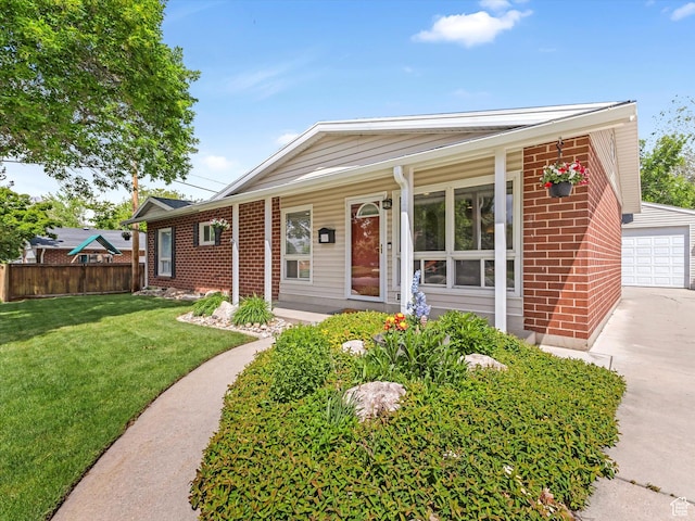1429 E Sumac Way, Murray, UT 84121 - single story home featuring brick siding, a garage, an outbuilding, and covered porch
