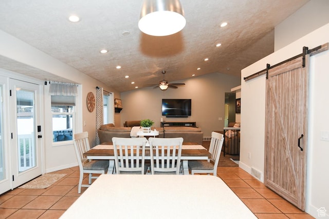 3155 S Autumn Blaze Cv W, West Valley City, UT 84128 - dining area featuring a barn door, light tile patterned flooring, recessed lighting, ceiling fan, and baseboards