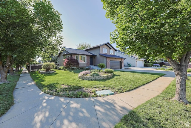 1298 S 500 E, Kaysville, UT 84037 - split level home featuring a front yard, stucco siding, driveway, and an attached garage