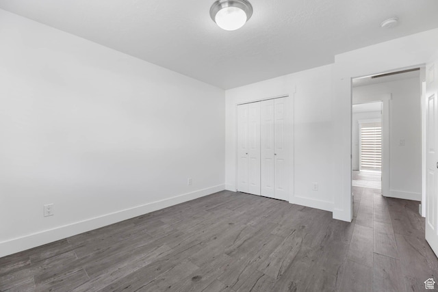 1298 S 500 E, Kaysville, UT 84037 - unfurnished bedroom with baseboards and dark wood-style floors