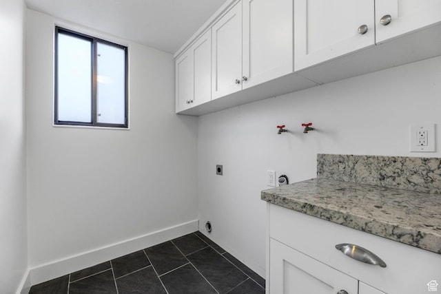 1298 S 500 E, Kaysville, UT 84037 - washroom featuring hookup for an electric dryer, cabinet space, baseboards, and dark tile patterned flooring