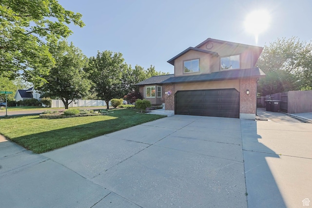 1298 S 500 E, Kaysville, UT 84037 - traditional-style home with an attached garage, driveway, and brick siding