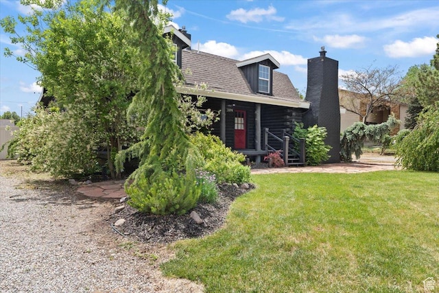 2899 W 8870 S, West Jordan, UT 84088 - view of front of home with a chimney, a front lawn, and log exterior