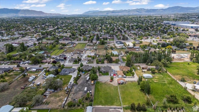 2899 W 8870 S, West Jordan, UT 84088 - aerial view of property's location featuring a mountain backdrop and nearby suburban area