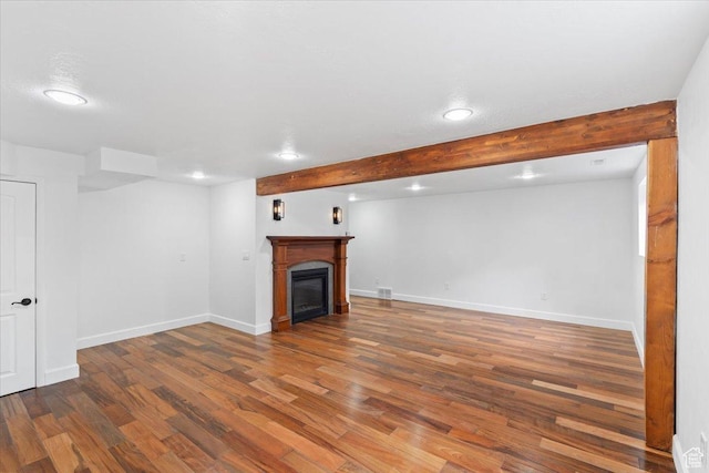 2899 W 8870 S, West Jordan, UT 84088 - finished below grade area featuring recessed lighting, wood finished floors, baseboards, and a glass covered fireplace