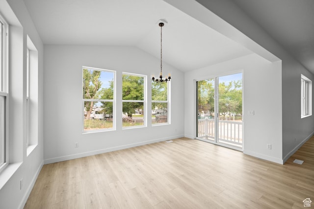 132 E Heron Ave S Unit 806, Saratoga Springs, UT 84045 - unfurnished dining area with a chandelier, light wood-type flooring, lofted ceiling, and baseboards