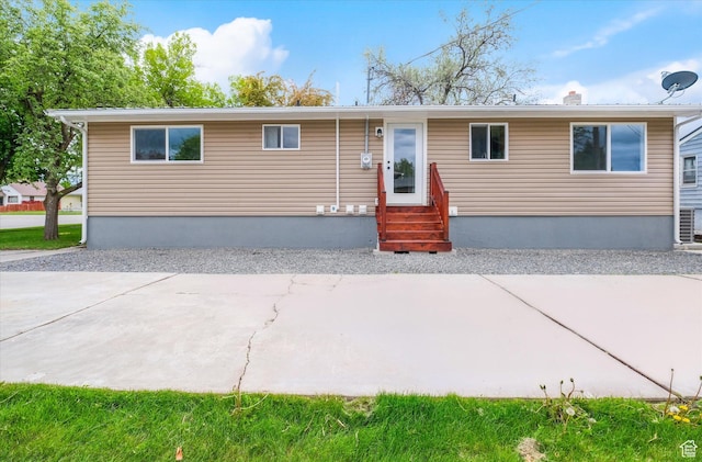 210 W 1 N, Preston, ID 83263 - ranch-style home with entry steps, a patio area, and a chimney
