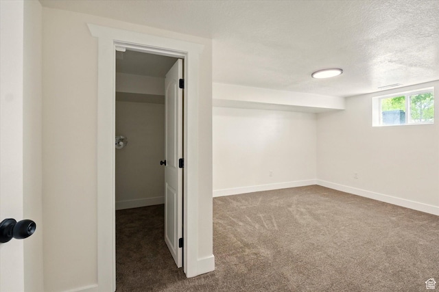 210 W 1 N, Preston, ID 83263 - basement with dark carpet, baseboards, and a textured ceiling