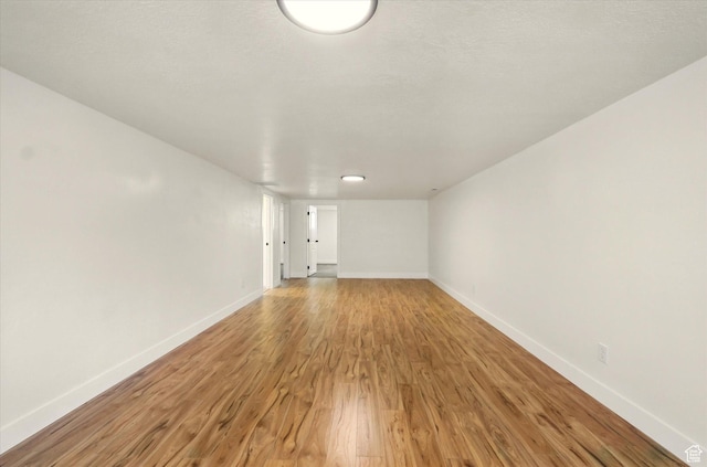 210 W 1 N, Preston, ID 83263 - spare room featuring light wood-type flooring and baseboards
