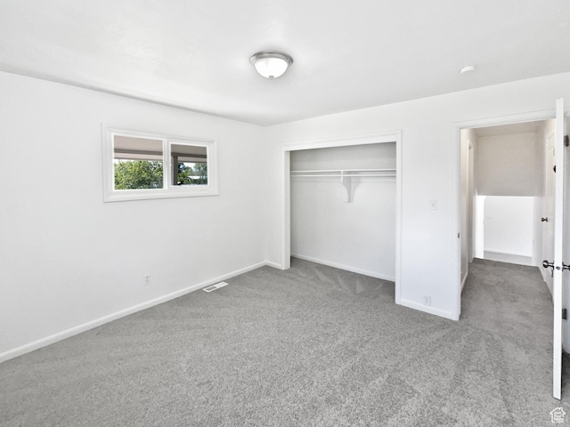 2959 W 1300 N, Clinton, UT 84015 - unfurnished bedroom with carpet floors, baseboards, and a closet